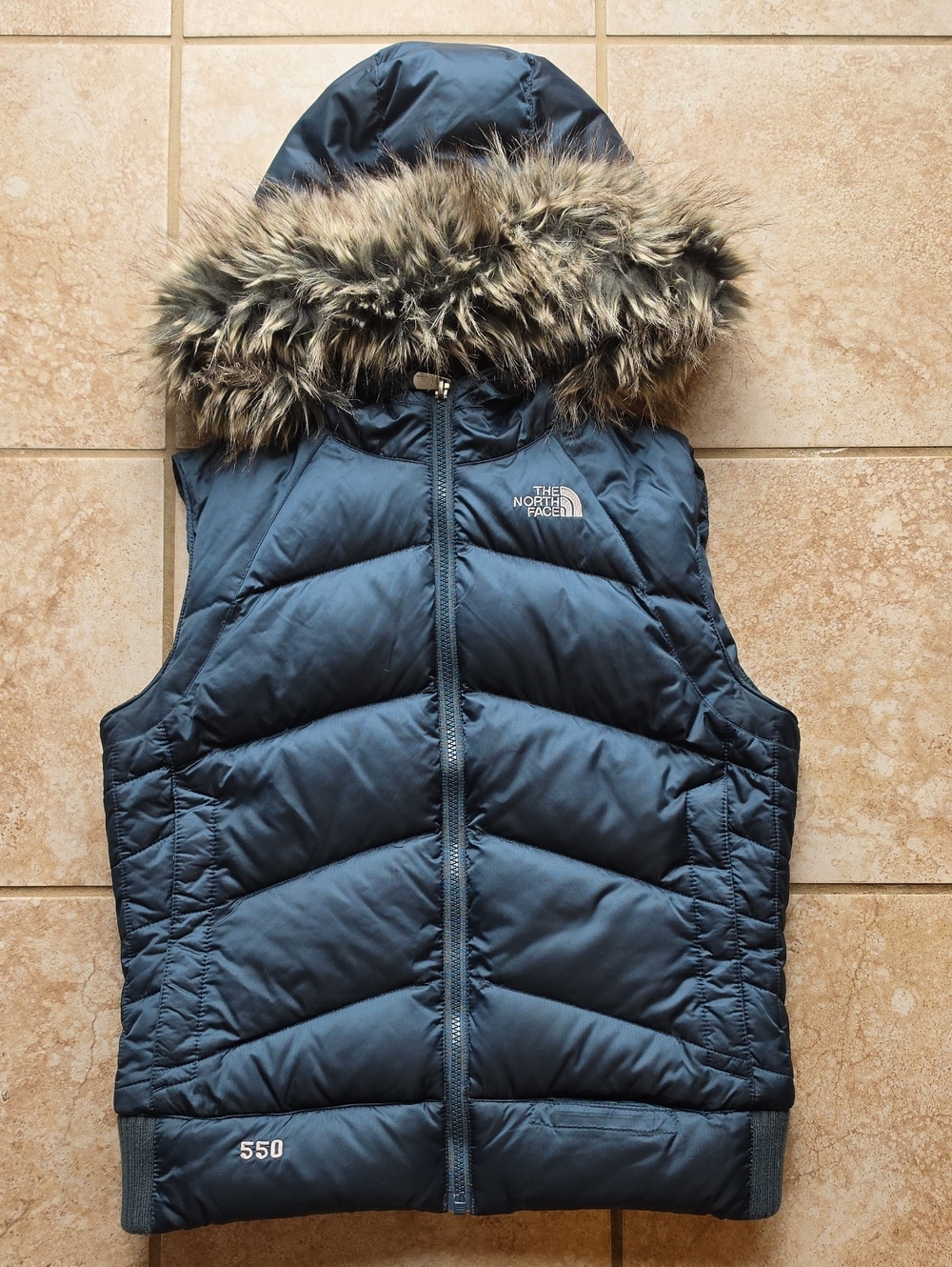 The North Face Puffer Vest with Faux Fur Trim Hood